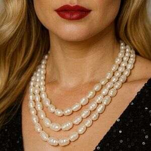 VINTAGE THREE-STRAND BAROQUE WHITE FRESHWATER PEARL NECKLACE (20 in length) *GUC